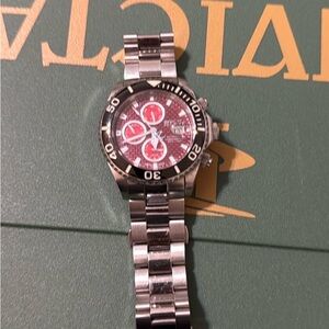 Invicta Silver Watch with Black and Red Details